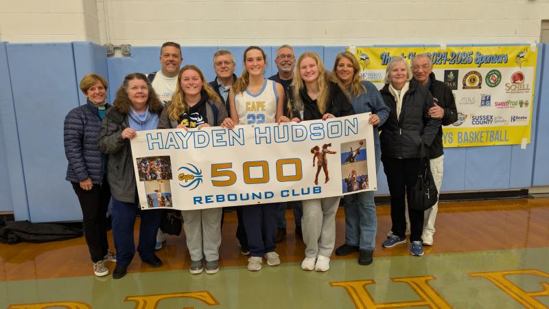 Cape senior Hayden Hudson was honored before the game, and gathered with family and friends after the game to celebrate joining the 500-rebound club. Shown are (l-r) Eileen Cannon, Ruth Hudson, Chuck Hudson, Alivia Heers, Charles Hudson, Hayden Hudson, Pat Cannon, Jenna Reinhold, Amy Hudson, Evelyn Cuthrell and Bob Cuthrell.