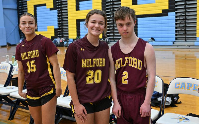Milford teammates get a picture after the game. Shown are (l-r) Bailey Masten, Molly Masten and Leopold Huot.