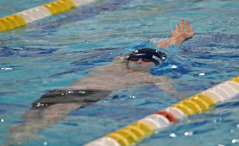 Sussex Academy’s Michael Whitaker swims the backstroke leg of the medley realy. He and Jackson Laux, Angel Figueroa and Christian Wright came in 10th with a time of 1:43.03.