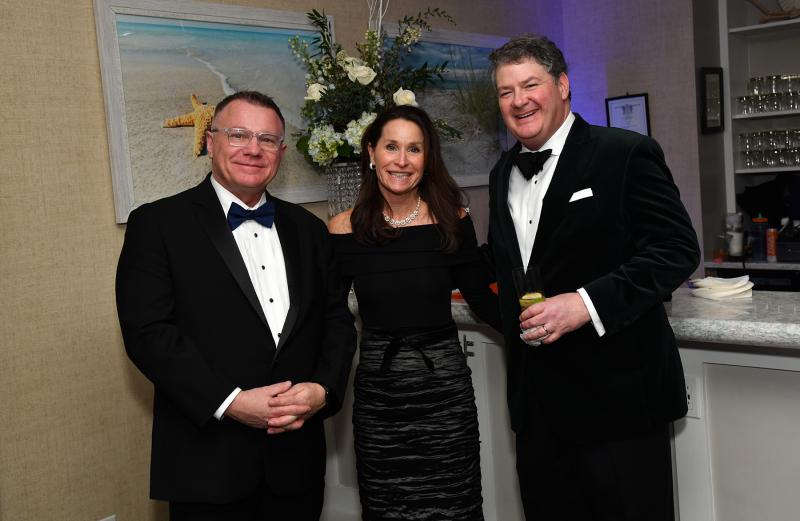 Gathered for a photo during the cocktail hour are (l-r) Richard Garrett, CBH executive director; Ann Lingo, gala committee member; and Jay Becker, gala sponsor.