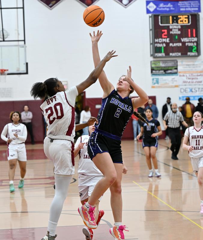 Royals junior Eve Bohinski takes a shot in the paint and is fouled by Hodgson’s Sanaa Saunders-Young.