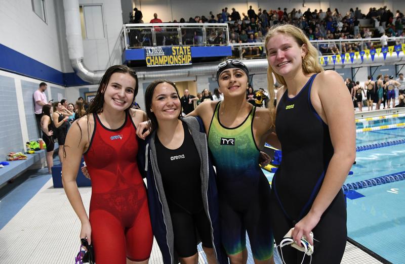 Cape’s third-place 400 free relay team is (l-) Isla Touw, Sidney Caldwell, Mia Jaoude and Jenna Reinhold.