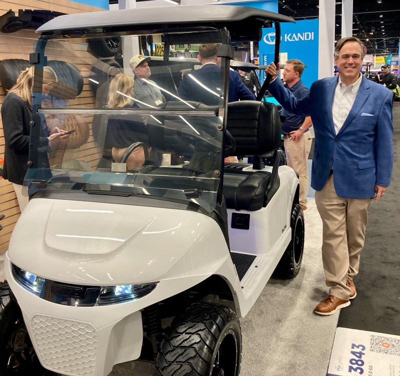 E-Z-GO’s new Phantom lithium-powered golf cart includes a wide range of features, including LED headlights, big tires and alloy wheels, special seats, a soundbar and digital displays. The limited-edition vehicle retails for $15,768. The Phantom’s showroom “model” standing right of the cart is Brandon Haddock, communications director for Textron, E-Z-GO’s parent company. FRITZ SCHRANCK PHOTO