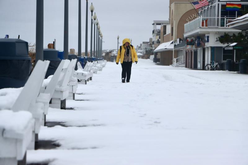 Deb Ressler made a special trip from Lititz, Pa., just to see snow on the Rehoboth Beach Boardwalk. BILL SHULL PHOTO
