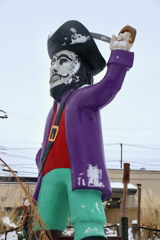 The pirate at the Midway mini golf course was mostly snow-free and looking for better weather ahead. BILL SHULL PHOTO