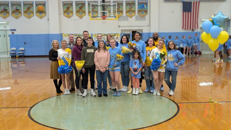 The seniors were escorted by their family support systems. In back are (l-r) Shelby Hogan, Brandon Hogan, Chuck Hudson, Amy Hudson, Ashley Soto, Havyn Greene, Karen Greene and Isaiah Greene, In front are Evie Hogan, Kelly Re, Nathan Re, Kathleen Palmer, Faith Re, Demi Soto, Carly Favoroso and Stephany Favoroso.