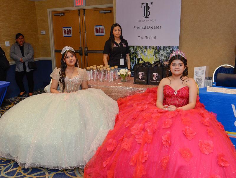 Representing Toledo Boutique’s formal dresses are (l-r) Yerely Fernandez, Ana Aguilera and Pricsilla Aguilera.