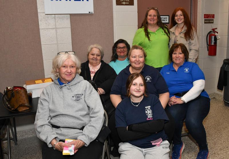 The Rehoboth Beach Volunteer Fire Company Ladies Auxiliary keeps the event running smoothly. Shown in back are (l-r) Ruth Ann Reynolds, Katy Miller and Ashley Catts. In middle are Joyce Burton, Vicky Card and Terry Brewster. In front are Faye Wiles and Emily Card.