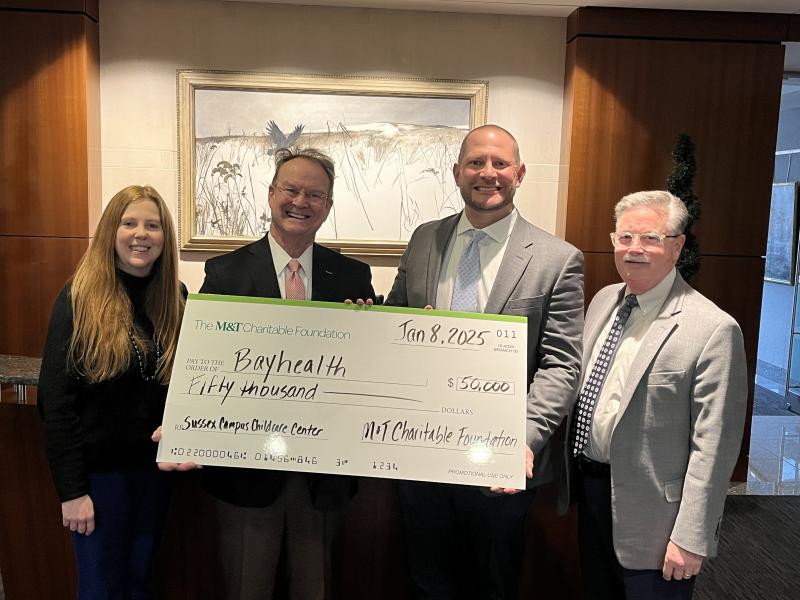 Check presentation attendees shown are (l-r) April Birmingham, M&T Bank senior vice president, M&T Charitable Foundation Mid-Atlantic regional manager; Terry M. Murphy, FACHE, Bayhealth president and CEO; Mark R. Hutton, M&T Bank executive vice president, Delaware regional president; and Lindsay Rhodenbaugh, MDiv, DMin, Bayhealth Foundation president, Bayhealth Medical Center senior vice president and chief development officer. SUBMITTED PHOTO