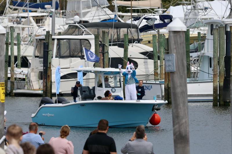 One if by sea. In this case, it’s the Easter Bunny coming along the canal, courtesy of the Freedom Boat Club.