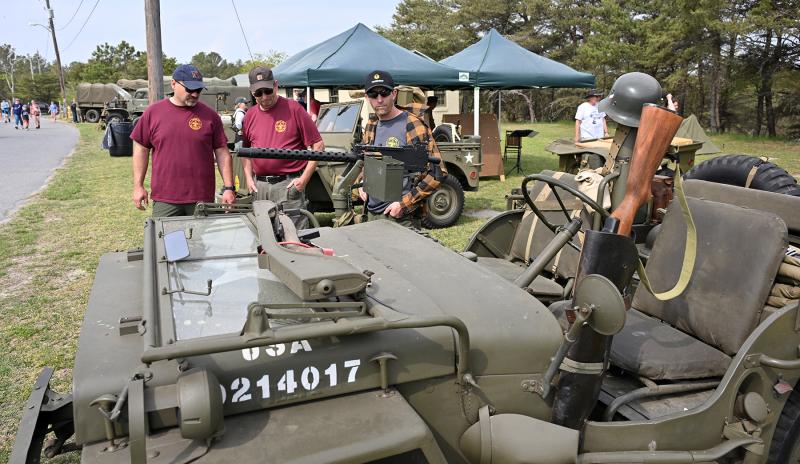 Looking over the World War II-era jeep are (l-r) Jeremy Reichart, Scott Holbrook and Joe Kuhns of Boy Scoot Troop 125 of New Oxford, Pa.