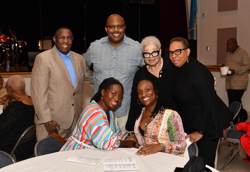 Enjoying the event in back are (l-r) Alan Kiser, Ron Taylor, Frances Earvin and Sintelle Taylor. In front are Marvarine Davis and Colleen Thompson.