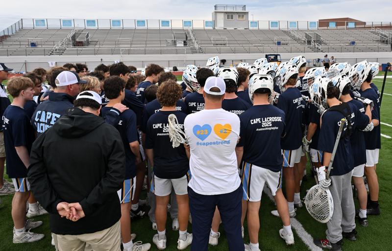 The Cape players think about their fallen teammates with a silent moment in the huddle before the game.