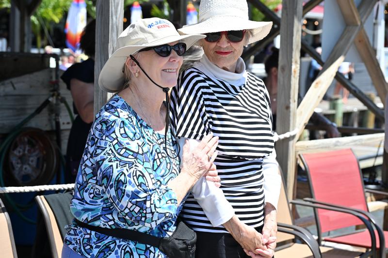 Dale Parsons’ daughter Kenna Parsons Ross, left, shares a moment with her sister-in-law Sharon Ross.