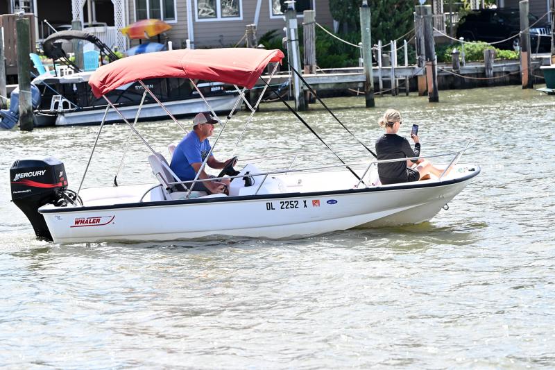 Capt. Drew Johnson and his wife Karen participate in the Blessing of the Fleet in their Boston Whaler.