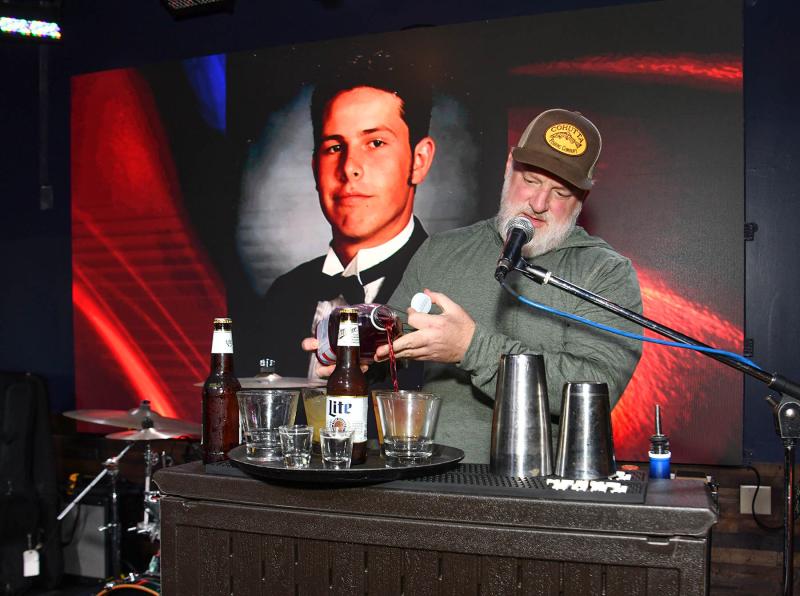 Spoonie’s good friend and local bartender Tim Hollenbeck explains the drinks he makes for the auction.