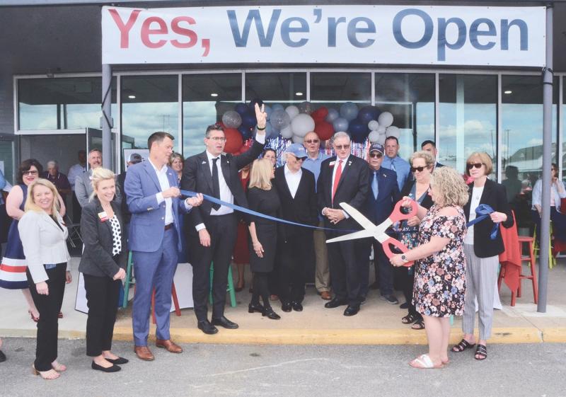 Community Bank Delaware ribbon-cutting attendees shown are in back (l-r) Amber Seymore, teller; Chris Benjamin, senior vice president, lending; Mike Vincent, former county council member; Rep. Danny Short, R.-Seaford; and Seaford Mayor Matt McCoy. In front are Angie Warrell, CFO; Staci Niblett, COO; Matt Parker, Seaford chamber; Gov. Matt Meyer; Diane Cooley, board member; Alexander J. Pires, CEO; Wm. Jack Riddle, president; Karen Willin, Seaford assistant manager; Wende Palmer, Seaford branch manager (cutting ribbon); and Judy Johnson, vice president. PHOTO COURTESY OF MIKE MCCLURE