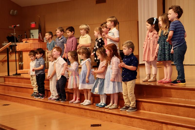 The Dolphin classes performs a song during the ceremony.
Shown in back are (l-r) Ryan Kalicki, Jack Whitby, Callahan MacLeish, Julian Murphy, Isabella Hart, Hollis Hopkins, Elliot Spence, Ava McGeady, Ainsley Skardo and Keats Frankum. In front are Aiden Blankenship, Mason Ciel, Chloe DiCanio, John Morrison, Frances Woods, Elise Gaeta, Mae Woods, Eleanor Hayes and Lucas Krantz.