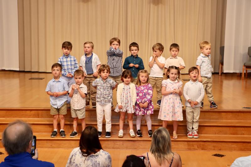 The Turtle class performs at graduation. Shown in back are (l-r) Brent Harvey, Neil Miller, Cooper Coveleski, Oliver Shinko, Brendan Steele, Eli Lyman and Tanner Geyer. In front are Parker Withers, Cooper Byrnes, Cash Weeth, Vivienne Weeth, Avery Jackewicz, Madison McGuiness and Jack Klosowski.