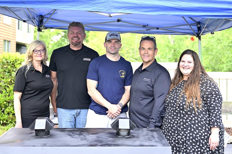 Greeting riders at Fairfield Inn outside Rehoboth are (l-r) Denise Bernardo with Atlantic Transportation, Dave Repass with Meineke Car Care and Atlantic Transportation, Nick DeMalto with the Delaware State Police, and Justin and Renee Brown with Atlantic Transportation.