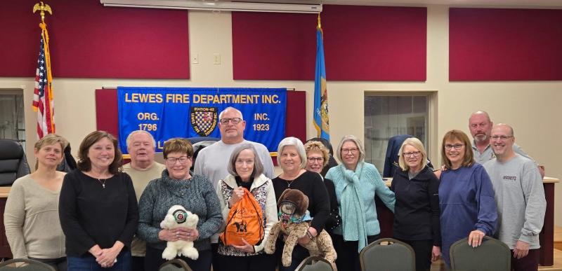 Lewes Fire Department donation presentation attendees shown are in back (l-r) Secretary Shawn Musgrove, President Wally Evans, Chief Bill Buckaloo, Debbie Reilly, Chris Macina, Marcia Kintner and Vice President John Colpo, In front are Debbie Dooley, Patty Halko, Alison Brick, Jane Heaton, Carolyn Flacco and Rich Flacco. SUBMITTED PHOTOS