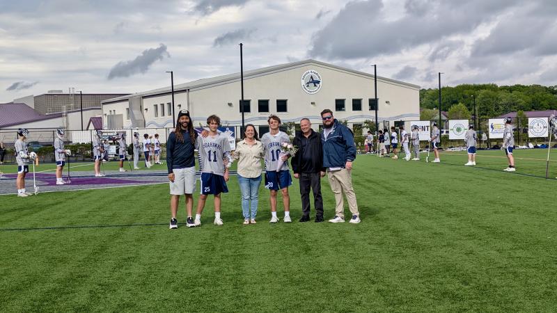 Ben Warren makes his way across the field with his parents Bill and Noell Warren and his younger brother and teammate Nic Warren. Ben Weathersby and Andrew Fox join them. Fox noted the whole offense runs through the elder Warren.