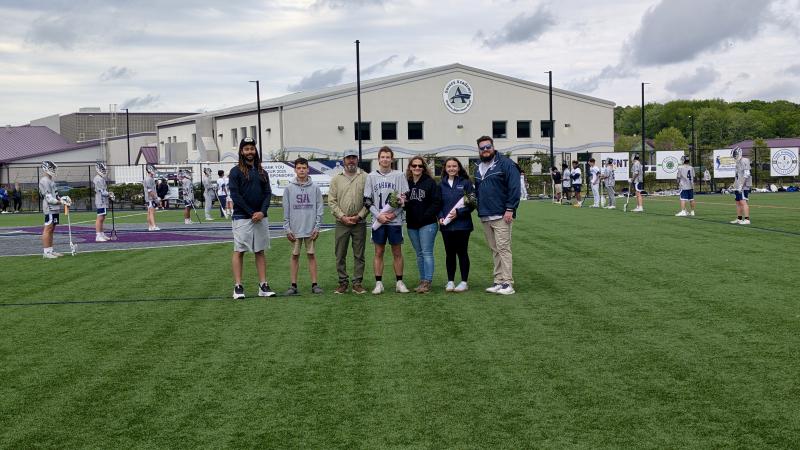 Jaxon Laux is joined by his mom Michele, dad David, brother Owen and Madison Jones, in addition to his defensive coach Ben Weathersby and head coach Andrew Fox.