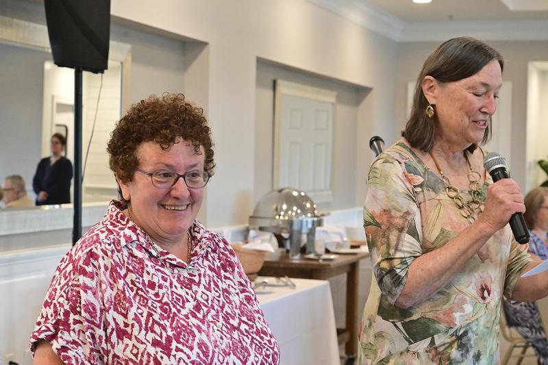 SPC board member Mary Boggi, left, and President Jill Hicks announce the winners of the Sussex Preservation Coalition’s Champions Award.