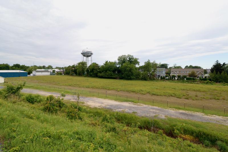 The Kennedy property looking southwest from the Freeman Highway bridge. This is the 1.5-acre portion of the property the contract buyers are offering to the city for use as a park or other open space.
Mayor and city council received a presentation on the property May 22, but did not decide whether to accept the offer. BILL SHULL PHOTO