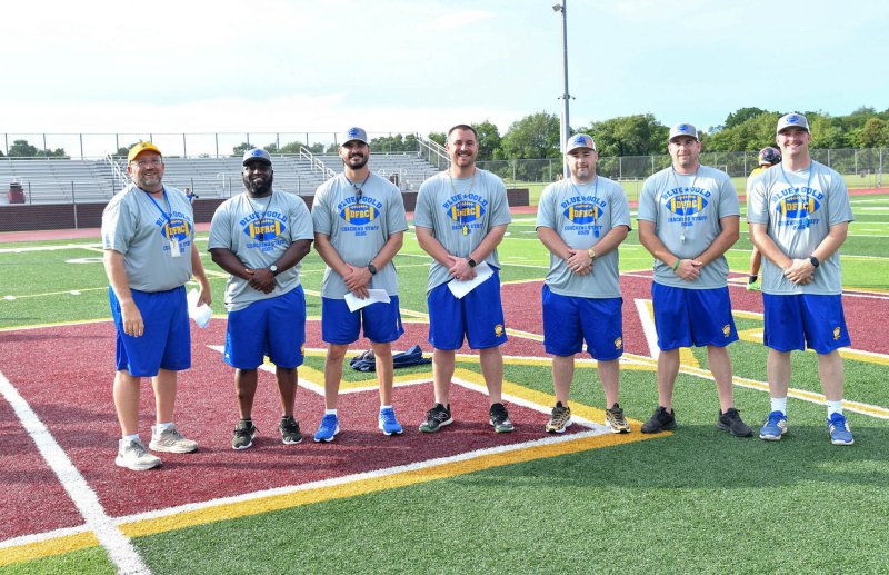 Coaching the Gold squad are (l-r) Mike Tkach, Milford/Cape; Eston Ennis, Sussex Tech; Quinn Abbott, St. Georges; Jed Bell, Milford; Alan Preston, Delmar; Phillip Townsend, Indian River; JD Messick, Woodbridge.