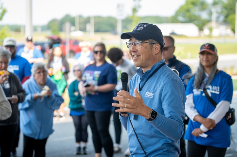 Dr. David Tam, Beebe Healthcare president and CEO, welcomes everyone to the Miracle Mile. MATTHEW CONLIN PHOTO
