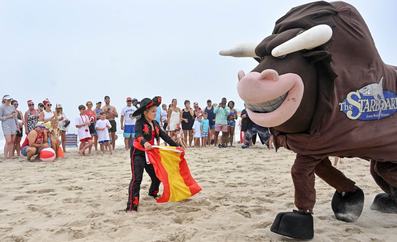 Despite her obvious size difference, matador Olivia Spangler, 7, knocks the bull down to size with her blue-belt karate kicks.