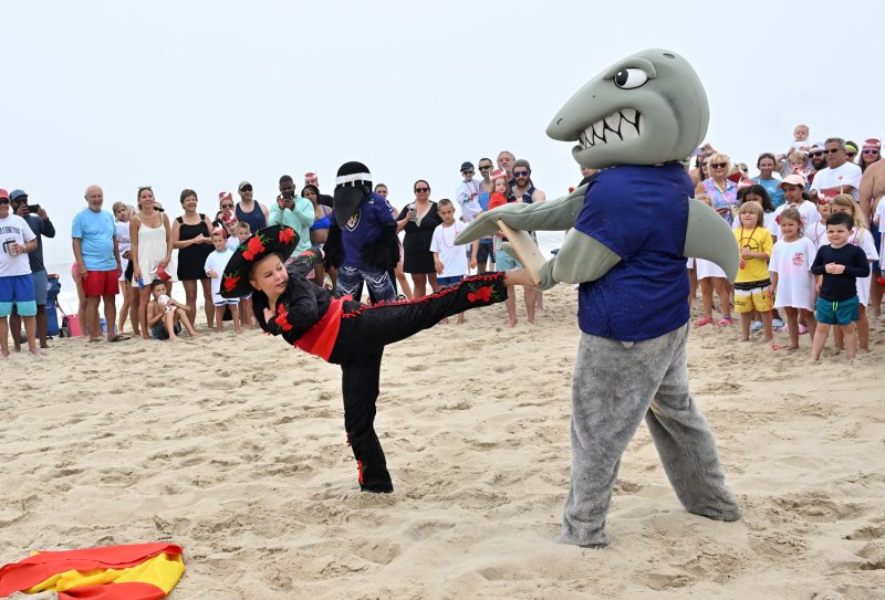 Matador Olivia Spangler, 7, practices her karate with The Starboard Shark before the fight with the bull.