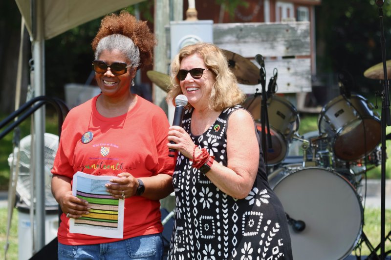 Lewes Councilwoman Trina Brown-Hicks, left, and Mayor Amy Marasco welcome people to the fourth annual Juneteenth celebration in George H.P. Smith Park. Brown-Hicks is one of the organizers behind the annual festival.