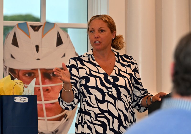 Michele Smith, the Cape boys’ lax boosters president, welcomes the team, parents and friends to the banquet.
