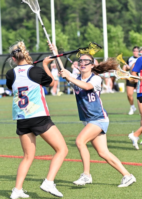 Blue team member and Sussex Academy grad Savannah Montgomery, right, plays close defense on Elle Roberts of Caesar Rodney.