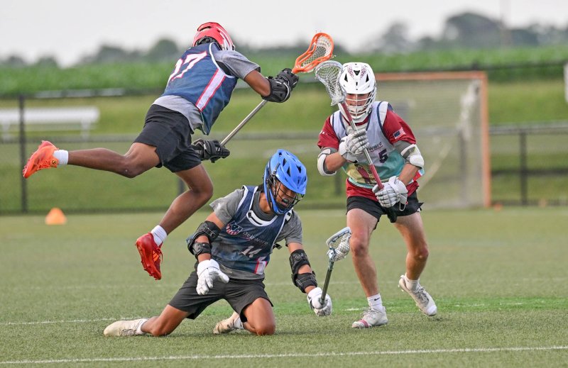 Red Lion’s Hayden Morrison and Charles Tao of Charter nearly collide battling for a loose ball with Logan Potts of Appo.