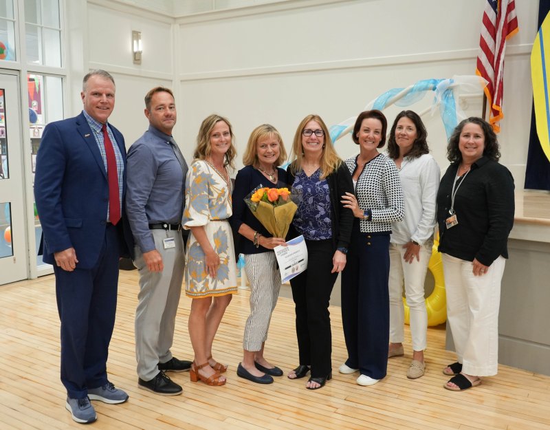 The Sussex Consortium presents its May substitute GEM Award to Michelle Berned at a school board meeting May 22 at Milton Elementary School. Shown are (l-r) Superintendent Bob Fulton, Sussex Consortium Assistant Principal Michael Thompson, Assistant Principal Erin Gannon, Michelle Berned, Principal Vivian Bush, board President Alison Myers, Assistant Principal Pamela Willmot and Assistant Principal Wendy Harrington. ELLEN MCINTYRE PHOTO