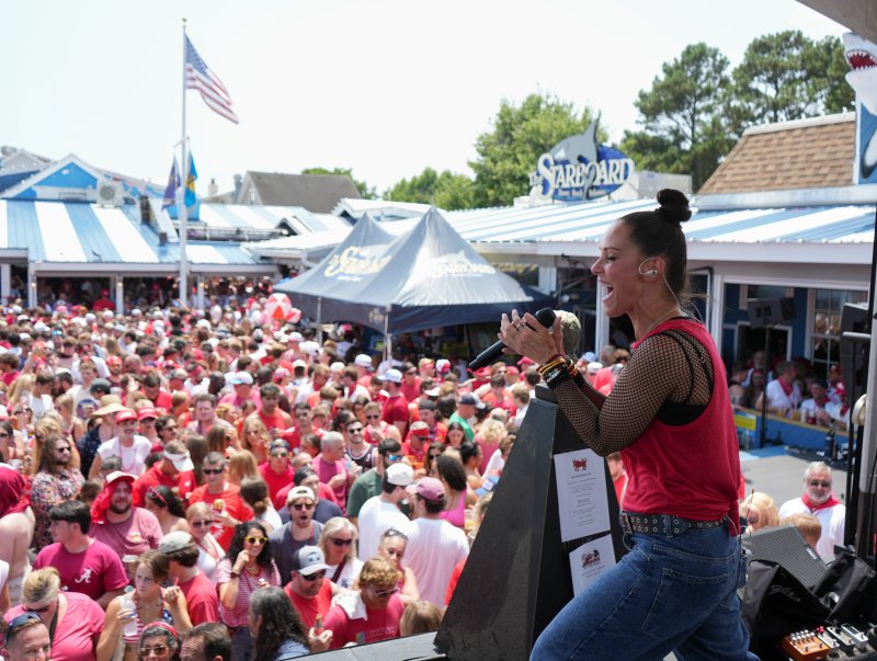 Kristen Kwolek, lead singer of Kristen & The Noise, performs at the Starboard’s 2025 Running of the Bull.