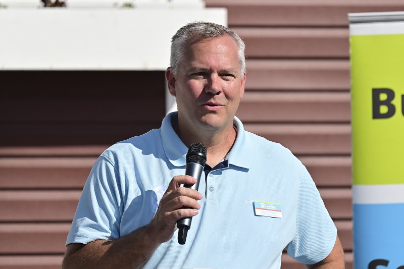 Kevin Gilmore, CEO of Sussex County Habitat for Humanity, welcomes everyone to the 200th house dedication.