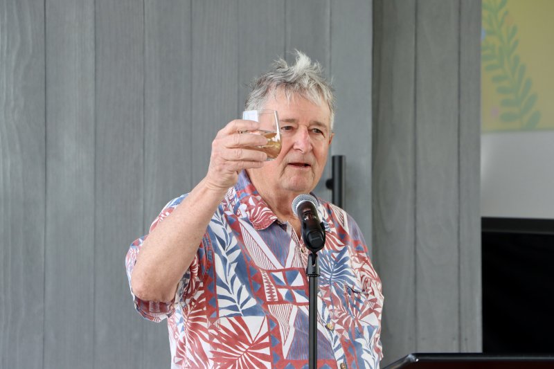 Hugh Leahy, Lewes Public Library trustee emeritus, offers a toast at the ribbon-cutting event. He thanked everyone who had a hand in making the facility a reality.