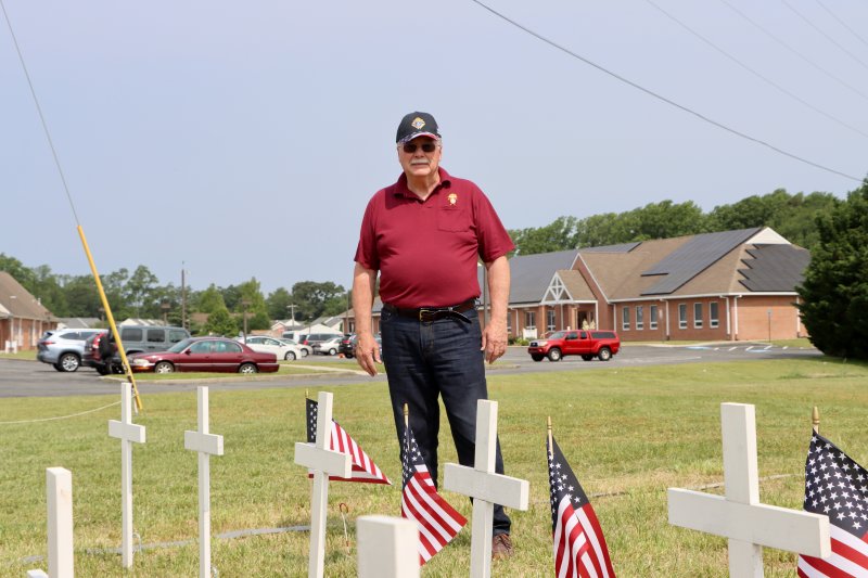 Paul Dombrowski, faithful navigator, which is the leader of the 4th Degree Assembly, stands next to the crosses June 5. He said the location is visible to the public and also to politicians who might drive by in the summer.
