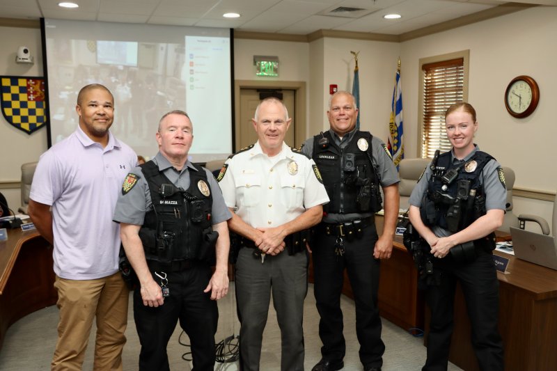Lewes Police Chief Tom Spell announced promotions and introduced a new officer to the force June 9. Shown are (l-r) Tyrone Woodyard, promoted to operational lieutenant; Rick Schiazza, promoted to sergeant; Chief Tom Spell; James Locklear, promoted to deputy chief; and Pfc. Siobhan Burton, the city’s newest police officer. BILL SHULL PHOTO