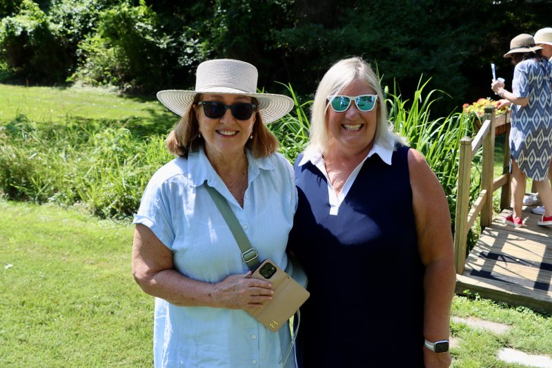 Joyce Davis and Sue Brugh of Pennsylvania admired the little things in the gardens at 9 Drake Knoll and, here, at 15 DeVries Circle.