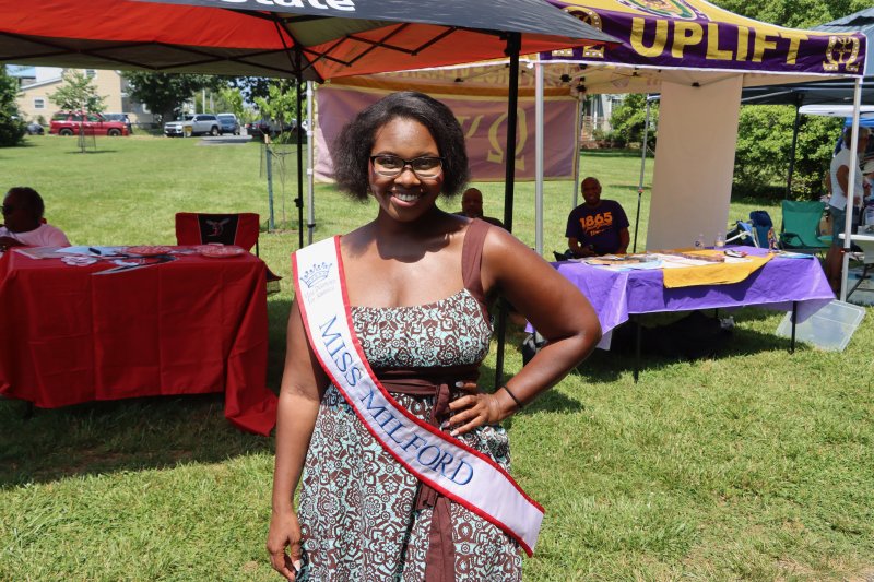 Desiree Hazzard, Miss Milford 2025, makes the rounds at the festival, spreading the word that young women can be successful in the pageant.