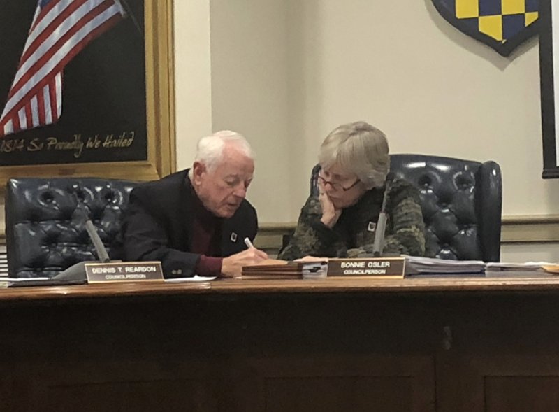 A file photo of Dennis Reardon, left, and Bonnie Osler during their tenure as members of Lewes City Council. Council passed a resolution June 9, renaming the large meeting room at the Margaret H. Rollins Community Center in Osler’s honor. Reardon read the resolution on behalf of his friend, colleague and mentor. NICK ROTH PHOTO