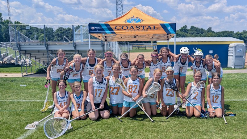 Coastal 32/33 was the last local team to play June 21 and got together for a post-game picture. Shown in back are (l-r) Allie Williams, Hailey Collins, Isabella Brueckner, Margot Hidell, Evelyn Killian, Piper Matta, Evan Chubb, Kennedy Riley, Ellis Hay, Brielle DiStefano and Rebekah Schindelbeck. In front are Clara Cramer, Aubrey Newcomb, Sophia Bell, Lucy Owens, Brennan Smith, Evelyn Hale, Kate DelliGatti, Finley Hanna and Kinsley Muzik. Avery Lavin is not pictured.