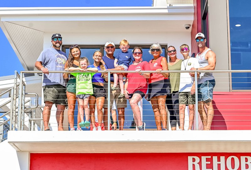 The Reynolds family on the deck of the new station are (l-r) Mark Reynolds, Summer Reynolds, Cora Reynolds, Shayne Reynolds, Jim Reynolds, Alex Reynolds, Ashlee Reynolds, Jo Ann Reynolds, Jenny Matta, Cole Matta and Dan Matta.