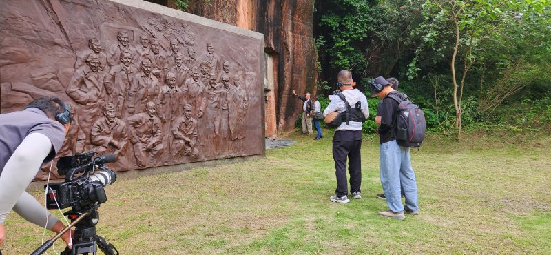 The documentary crew visited a cultural heritage center in Quzhou that has a large memorial to 20 Raiders outside a cave where Chinese people cared for them before they were taken to safety.