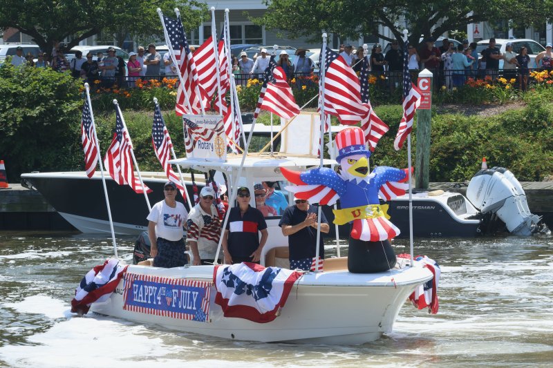 The folks from the Lewes-Rehoboth Rotary Club turn up in their red, white and blue. The Rotary Club hosts the boat parade every year.